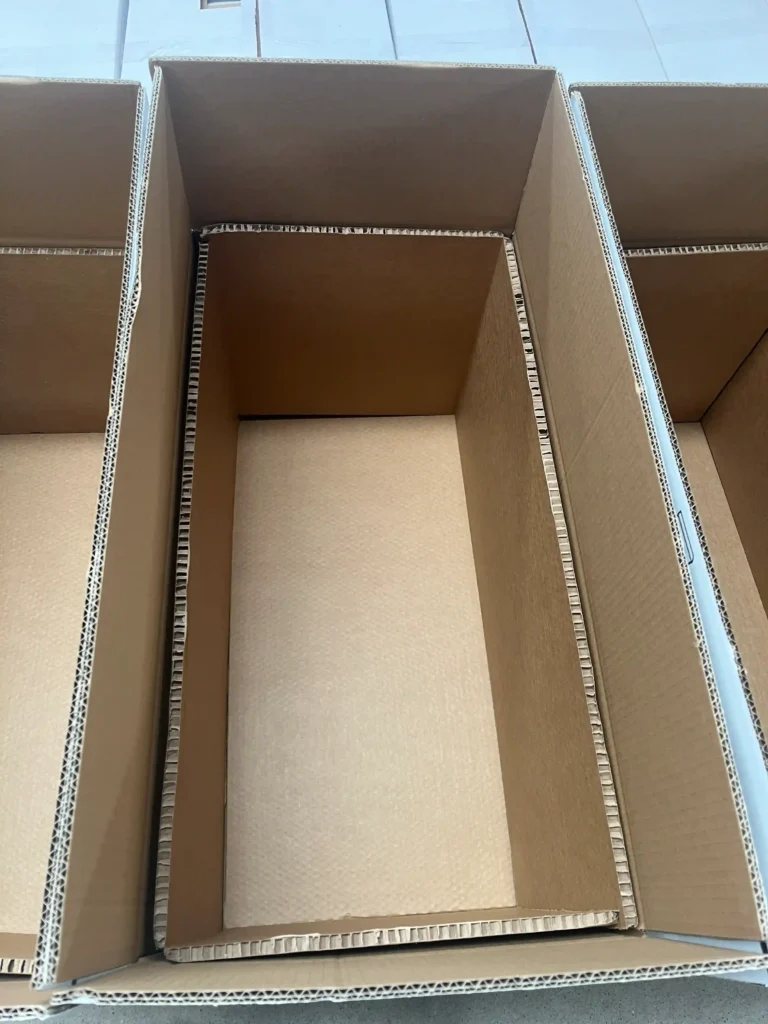 Properly packaged ceramic toilet with protective foam and cardboard packaging
